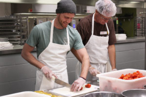 Volunteer serves at Second Helpings during cross-country trip to raise awareness for homelessness