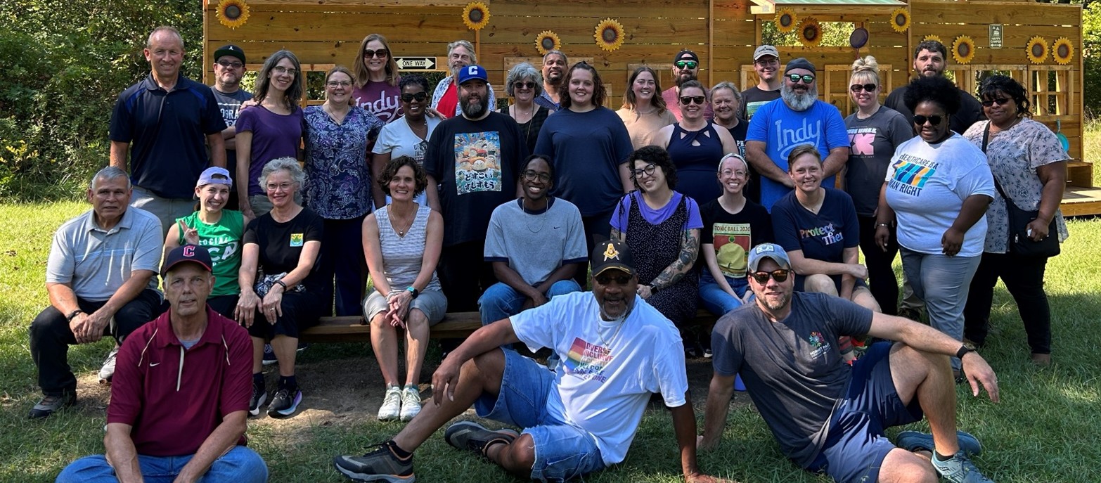 Second Helpings staff taking a group photo outside